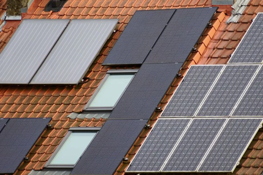 Solar panels fitted across a tiled roof